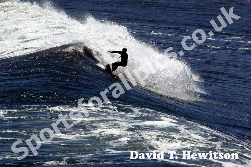 Surfing in New Zealand.
